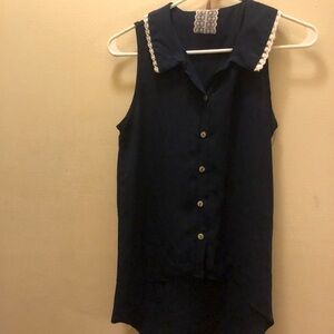 mauve peter pan style navy collared shirt